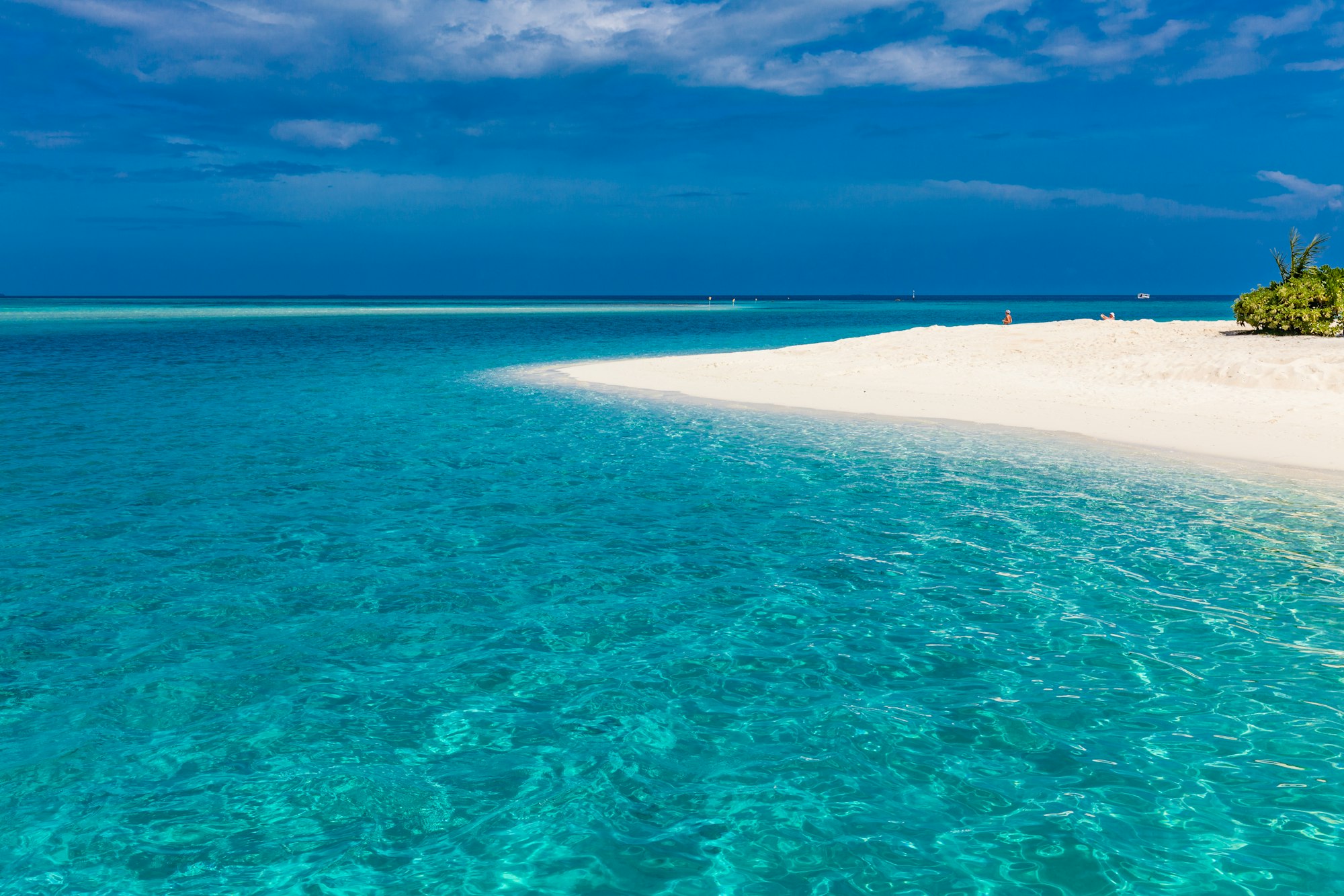 White sandy beach in Maldives with amazing blue lagoon