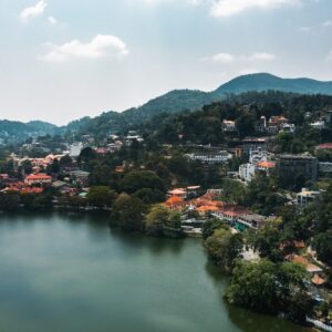 Aerial drone view of Kandy lake and city famous country landmark in Sri Lanka.